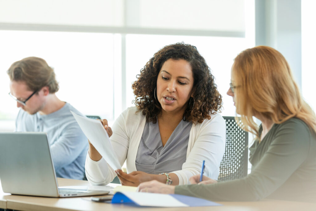An image of two learners collaborating and working together.
