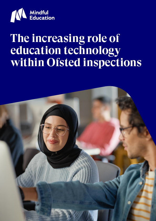 Cover image of the Mindful Education thought piece titled: 'The increasing role of education technology within Ofsted inspections.' The image shows an adult learner being taught in a classroom setting by a further education tutor.
